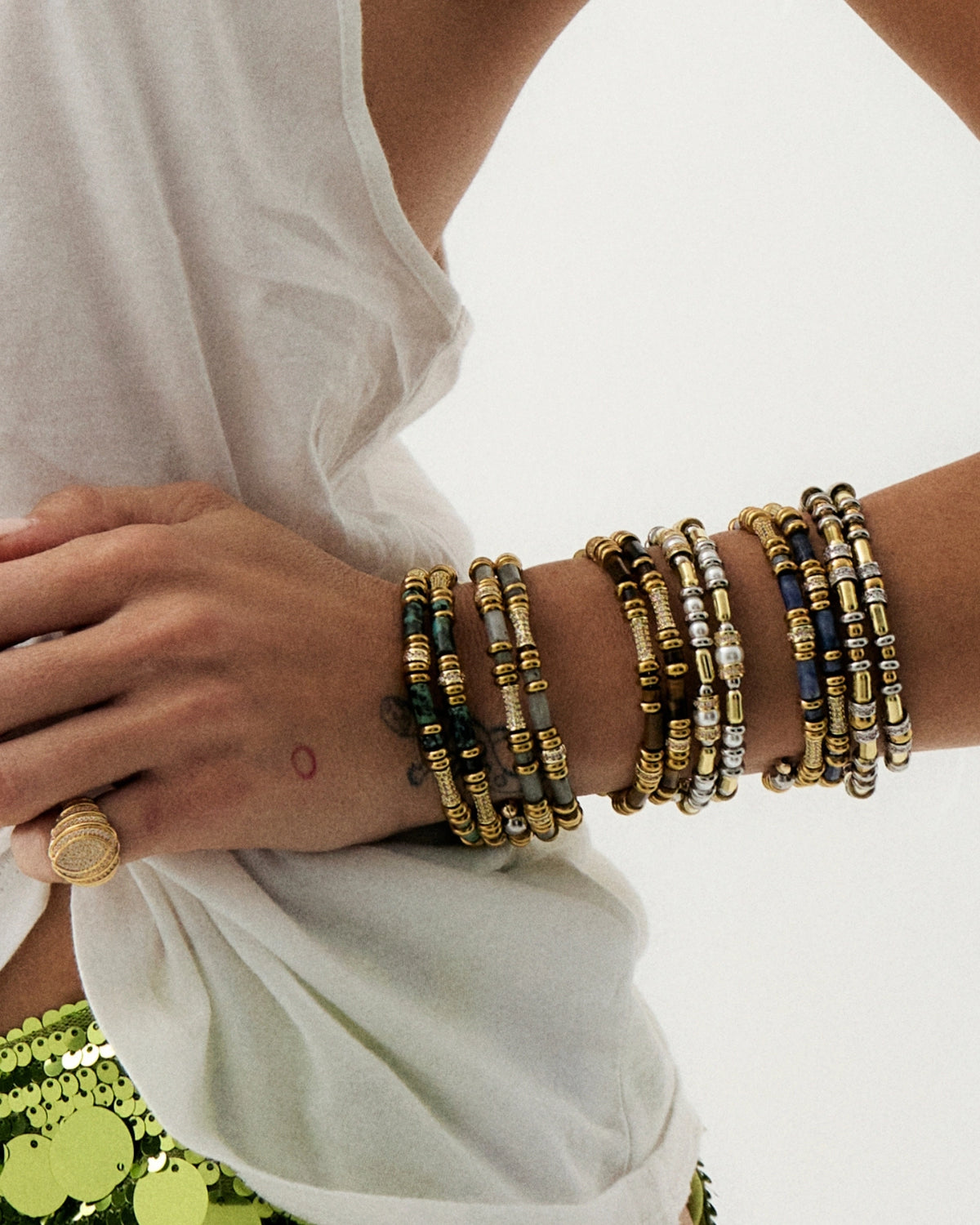 Pulsera de disco de oro y plata